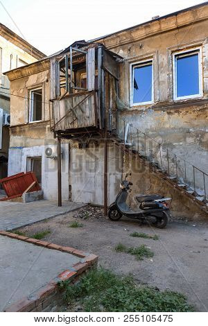 A Colorful Landscape Of Ruined Houses In A Poor Neighborhood For Poor People. Construction Of A Poor