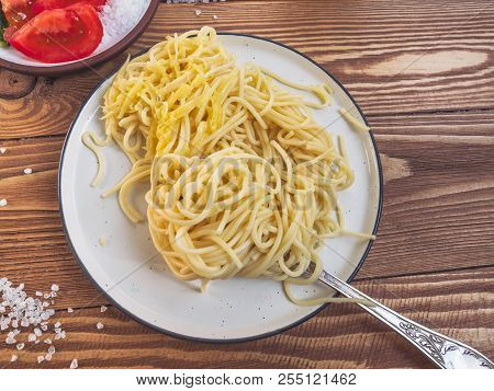 Spaghetti Pasta With Tomatoes, Basil And Parmesan Cheese, Top View