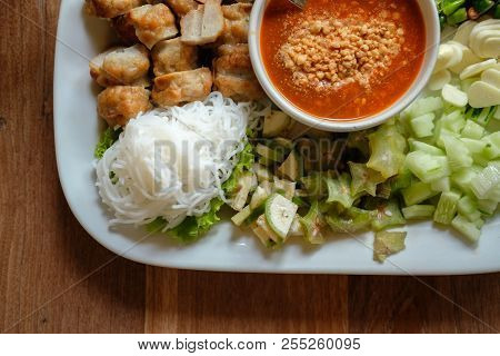 Minced Pork Sausage, Fermented Rice Noodle & Vegetable Served With Chili Sauce. Vietnamese Food Call