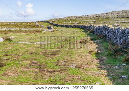 Hiking Trail With Stone Walls In Burren Mountains
