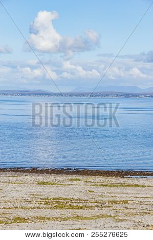 Fanore Beach In Burren Mountain With Galway Bay In Background