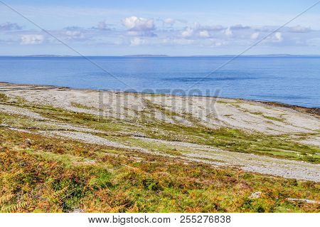 Fanore Beach In Burren Mountain With Aran Islands In Background