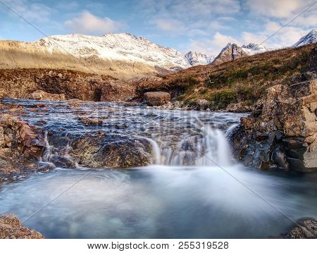 Multiple Waterfalls, Seemingly Vibrant Blue And  Green In Color, With Cold Swimmable Pools. Popolar 