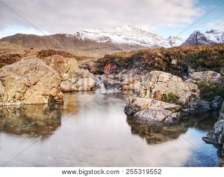 Multiple Waterfalls, Seemingly Vibrant Blue And  Green In Color, With Cold Swimmable Pools. Popolar 