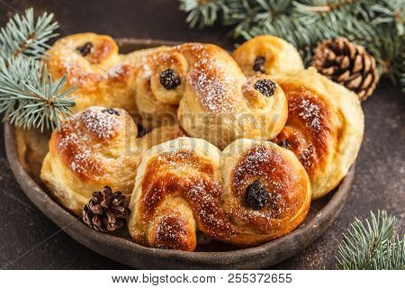 Traditional Swedish Christmas Saffron Buns (lussebulle Or Lussekatt). Swedish Christmas. Dark Backgr