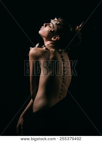 Halloween Ideas Concept. Woman With Thorns On Skinny Back And Shoulders Fantasy Creature. Girl With 