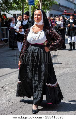 Sardinia, Italy. Feast Of The Redeemer, Traditional Costumes Parade.