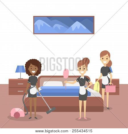 Gorup Of Maids Cleaning Hotel Room. Female Staff