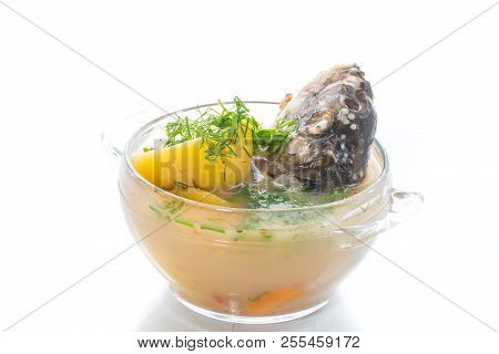 Vegetable Soup With Fish In A Glass Bowl