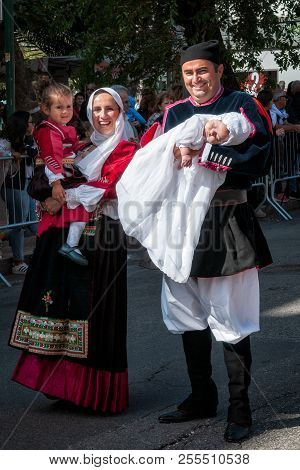 Sardinia, Italy. Feast Of The Redeemer, Traditional Costumes Parade.