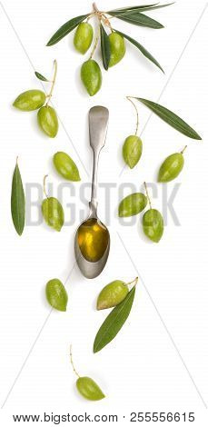Top View Of Spoon With Olive Oil, Twig Of Olive Tree And Green Olives Fruits Isolated On White Backg