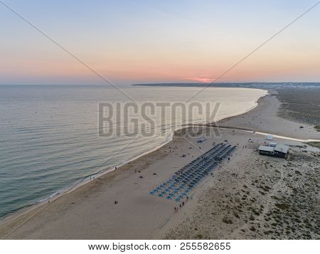 Aerial Dusk Seascape Of Salgados Beach In Albufeira, Algarve Tourism Destination Region, Portugal.