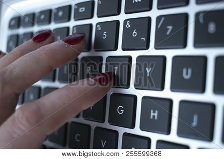 Woman Typing On Laptop Pc