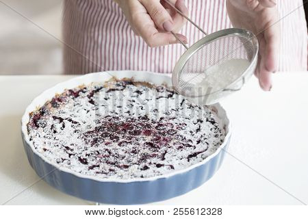 Clafoutis Cherry Pie. Preparation Of A French Pie With Cherries
