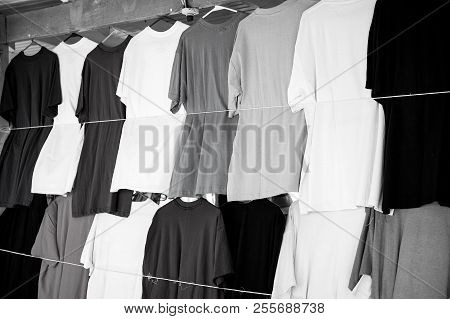 Tshirts Hang In Local Shop Or Market In Castries, St.lucia. Colorful Clothes On Sale. Sale, Shopping