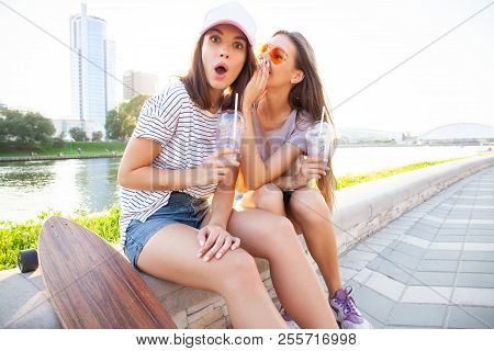 Two Pretty Cuter Teenagers Shares Secrets, Gossip. Surprise Face, Emotions, Best Friends Wearing Sty