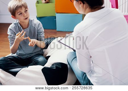Child Talking With Teacher During Extracurricular Classes At Home