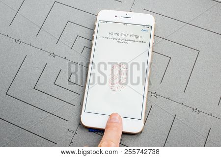 Paris, France - Sep 26, 2016: Male Hand Holding New Apple Iphone 7 8 Plus After Unboxing And Testing