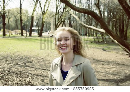 Happy Blrunette Young Woman In Green Spring Park Smiling, Lifest