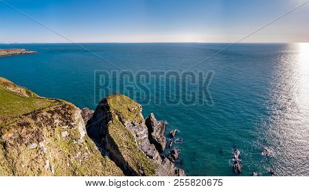 Aerial View Of The Beautiful Cliffs Close To The Historic South Stack Lighthouse On Anglesey - Wales