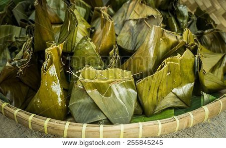 Nagasari, Traditional Steamed Cake Made From Rice Flourfilled With Sliced Of Banana. Wrapped In Bana