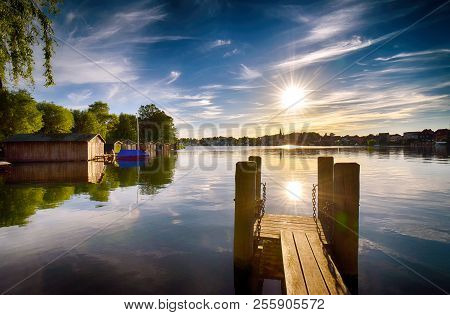 Sunset On The Lake With Jetty In Malchow (mecklenburg-vorpommern / Germany)