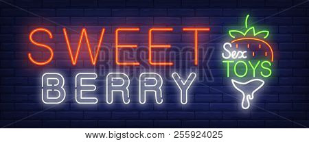 Sweet Berry Neon Sign. Glowing Sex Toys Lettering And Strawberry In Chocolate On Brick Background. N