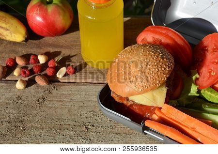 Lunch Boxes With Food Ready To Go For Work Or School, Meal Preparation Or Dieting Concept. Hamburger
