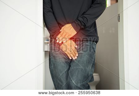 Male Patient Prostate Cancer With Hands Holding His Crotch,man Health Care Concept