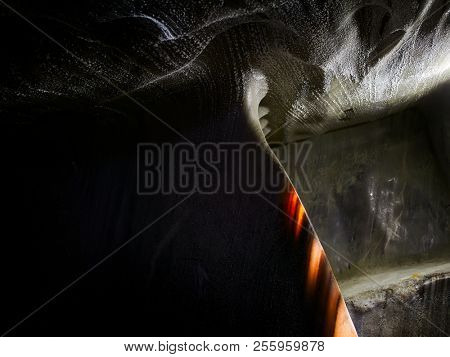 curvy shapes of salt walls in underground galleries of Turda salt mine, Romania
