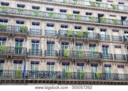 Facade Building With Windows And Balconies. Architecture And Design Concept. European Architecture. 