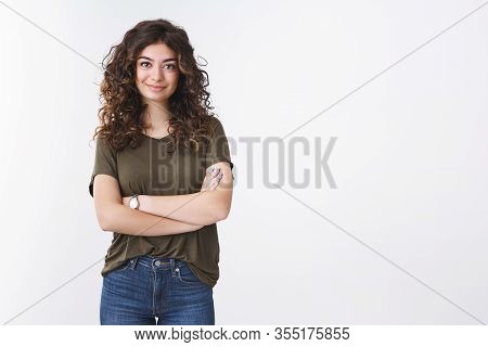 Sassy Attractive Confident Freelance Armenian Girl With Curly Hair Standing Self-assured Arms Crosse