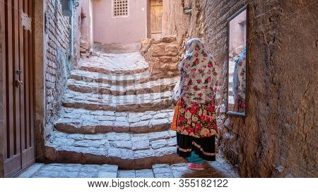 Abyaneh, Iran - May 2019: Unidentified Iranian Woman With Traditional Abyaneh Persian Dress