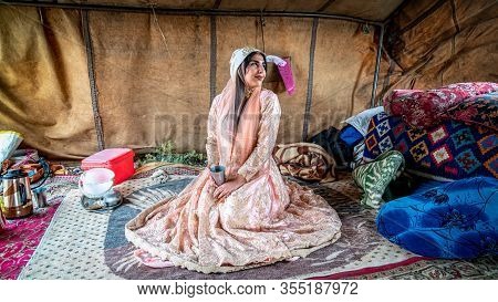 Shiraz, Iran - May 2019: Beautiful Qashqai Nomadic Woman Inside Her Tent. The Qasqhai Are Nomadic Pe