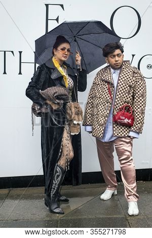 London, Uk- Febryary 15 2020: Fashionable People On The Street . Street Style