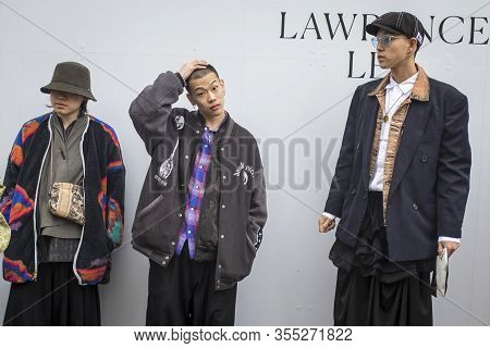 London, Uk- Febryary 15 2020: Fashionable People On The Street . Street Style