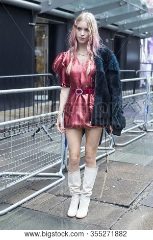London, Uk- Febryary 15 2020: Fashionable People On The Street . Street Style