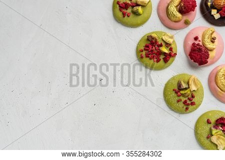 Matcha Chocolate Medians With Nuts And Freeze-dried Raspberries