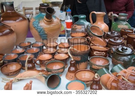 Pottery Jugs At The Fair. Handicrafts Of Folk Potters.