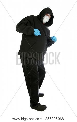 2019 Novel Coronavirus. 2019-nCoV. Wuhan, China 2019 Novel Coronavirus. Man is scared of the Coronavirus2019. Clipping Path.  Wearing a Paper Face Mask and Latex Gloves for safety. 