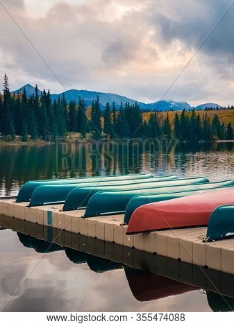 Jasper Town Canada, Lakeshore With Colorful Kayak, Sunrise By The Lake At Jasper , Lac Beauvert Albe