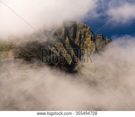 Fluted Rocks Of The Na Pali Mountains Through The Clouds From Pihea Trail Near Puu O Kila Lookout On