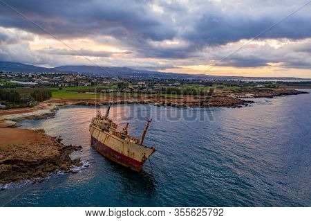 Aerial Drone View Ship Wreck On The Beach. Pegeia Near Paphos On Cyprus
