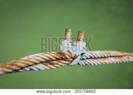 Steel Turnbuckle And Steel Sling Anchored Safety Net Into Concrete Block