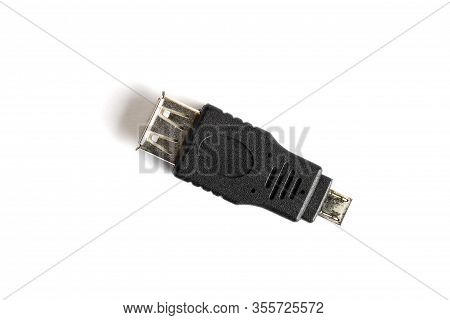 Smartphone Otg Connector On A White Background, Close-up, Isolate, Top View