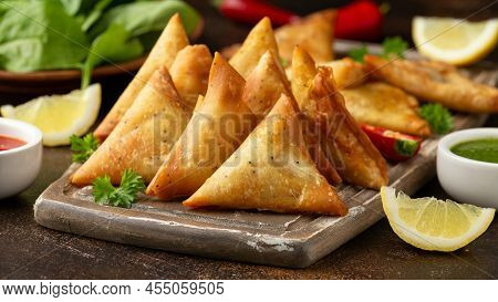 Fried Samosas With Vegetable Filling, Popular Indian Snacks On Wooden Board