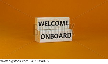 Welcome Onboard Symbol. Concept Words Welcome Onboard On Wooden Blocks On A Beautiful Orange Table O