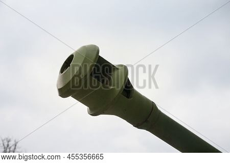 Selective Blur On The Cannon Head Of An Artillery Howitzer, In Military Green Color, That Was Used D