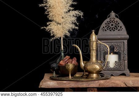 Ramadan Kareem And Iftar Muslim Food, Holiday Concept. Trays With Nuts And Dried Fruits And Latterns
