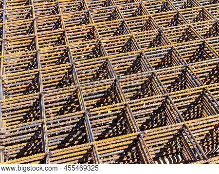 Frame Mesh Made Of Steel Reinforcement Rusted From Atmospheric Precipitation, Selective Focus